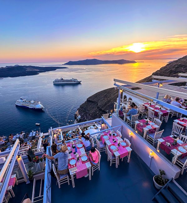Lithos Restaurant, Fira, Santorini — grilled seafood and wine at sunset